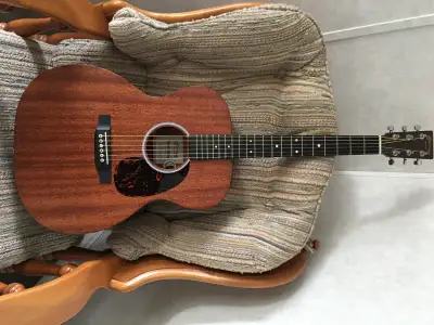 Purchased new a year ago from Wentworth Music and played for half the year. Solid sapele back and si...