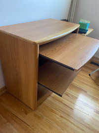 Desk with pull out shelving