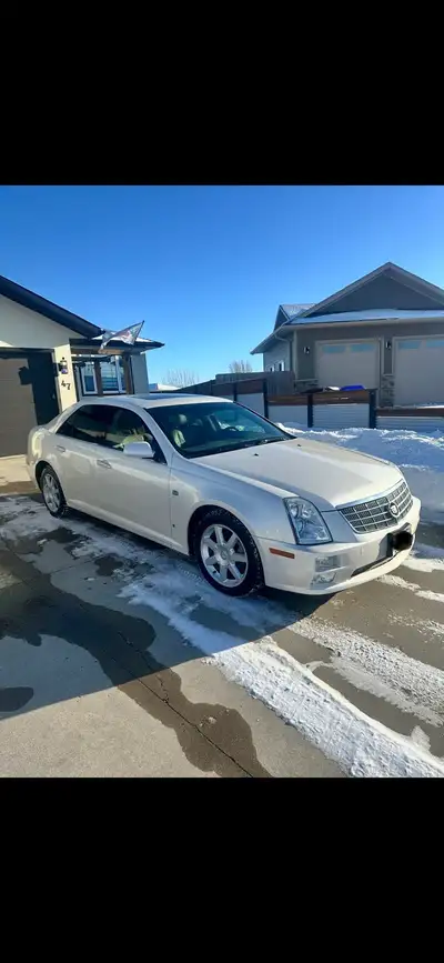 2006 Cadillac STS 6 cyl. Fully loaded with heated leather seats, power mirrors, push to start igniti...