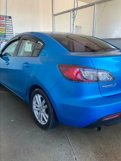 2010 Mazda 3 sedan 224890km Clean car Ac & heater work Brakes are 50 % Tires are 50 % Back up camera...