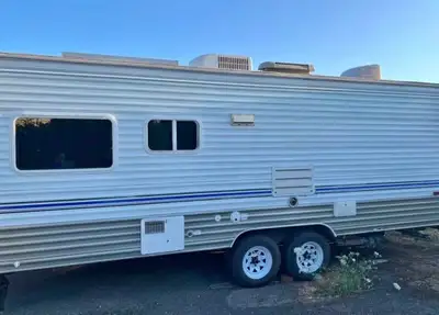 Approximately 23–24 ft. Great functional layout with lots of storage and everything you need for cam...