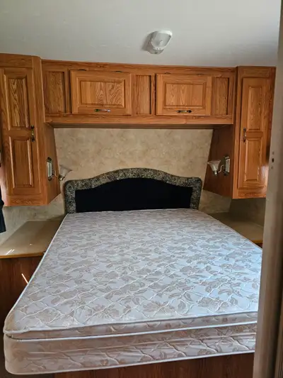 28ft, with a single slide out in living room. 12V power supply, GVWR 8,500lbs approx weight: 6,544lb...