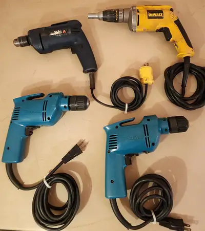 2 Makita 3/8 Corded Drills Model DP3740 Selling For $30 Each DeWalt VSR Drywall Screw Gun Model DW27...