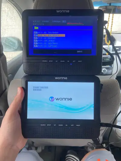 Dual screen car dvd player in good condition They are fully working u can insert a dvd and play any...