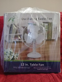 12" oscillating table fan, NEW
