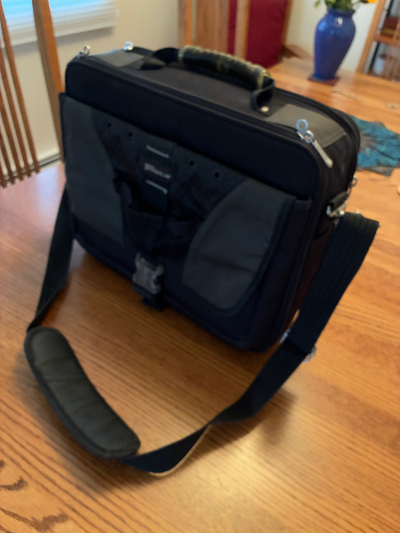 Targus Computer Shoulder Bag Accommodates 11” X 14” computer Many internal pockets to organize equip...