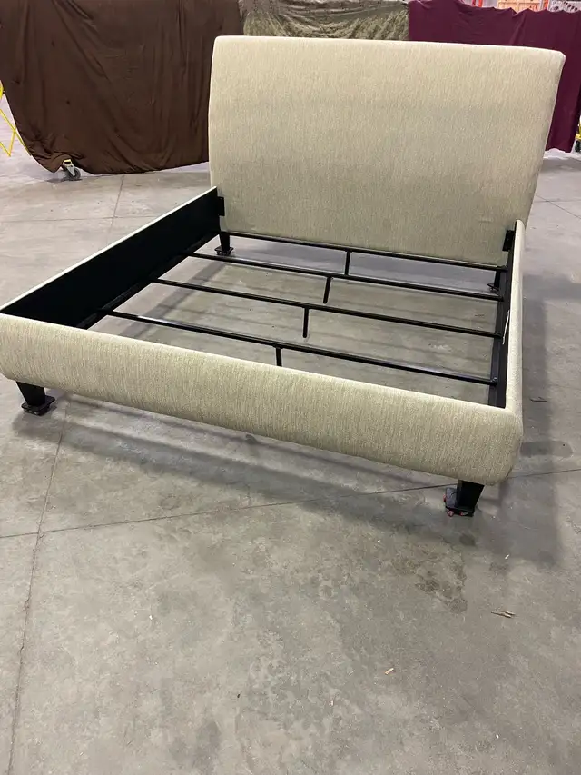 king size bed with fabric cushion frame and headboard.63735876449921122