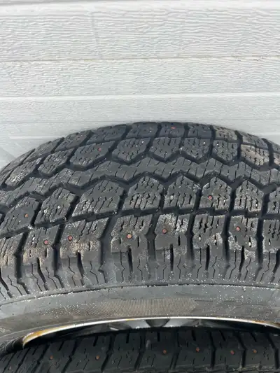 I am selling a set of used tires mounted on rims,studded. Lots of tread left