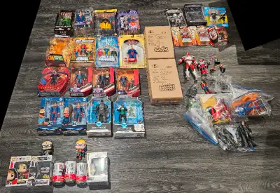 For sale, a large action figure lot of (primarily) DC action figures. Most are sealed with some exce...