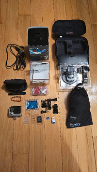 GoPro HERO 4 Silver with Accessories and 64GB microSD Card