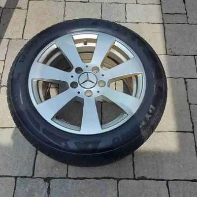 These used Mercedes C230 rims come equipped with 205/55R16 winter tires, perfect for navigating the...