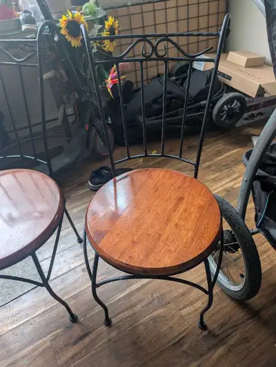 2 wrought iron chairs with beautiful wood seats , View more
