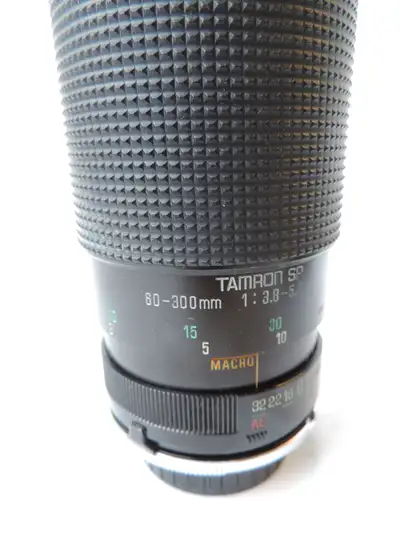 FOR THE FILM SLR CAMERA PHOTOGRAPHER OR ENTHUSIAST: This TAMRON SP 60-300 mm f 3.8 manual focus Macr...