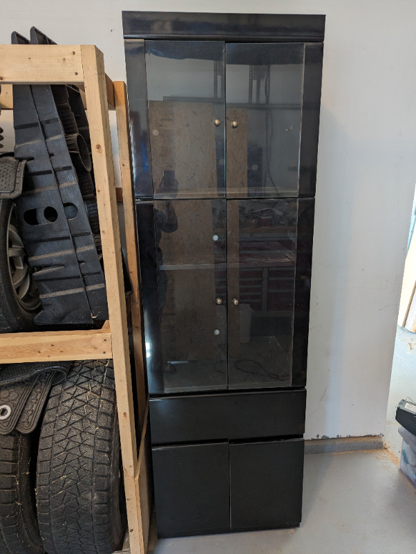 Black dresser (25" W x 18.5"D x 80.5" H) in Dressers & Wardrobes in Windsor Region