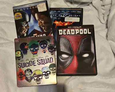 Civil War still in plastic, along suicide squad is a metal tin. Comes from a smoke free house in the...