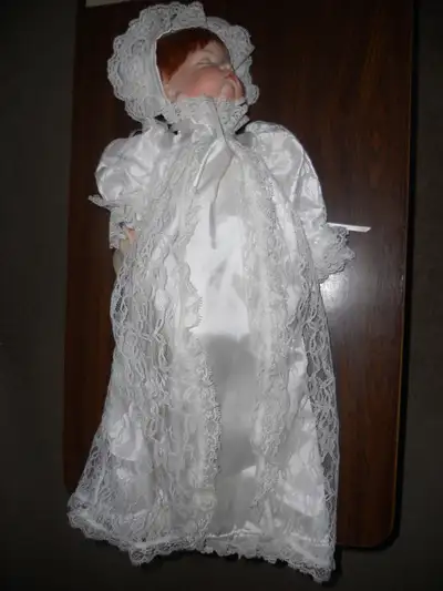 Baby doll dressed in christening outfit Girl doll dressed in skates Baby doll Girl doll dressed in w...