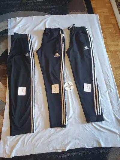 I'm offering a selection of men's and boy's Adidas track pants, all in size small, perfect for sport...