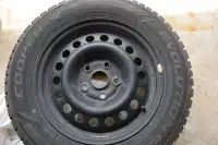 Tires: Cooper M&S 195/65R15 winter tires on steel rims