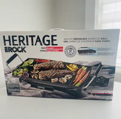 Brand new Heritage “The Rock” indoor smokeless BBQ grill, still in original box. Perfect for grillin...