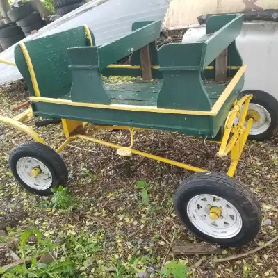 Light enough that a pony can pull it. Has good suspension and tires. The floor is buckling a bit. Al...