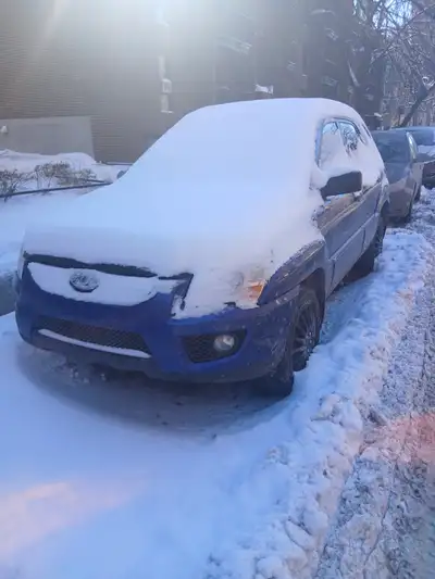 2009 KIA SPORTAGE BONNE ÉTAT AUTOMATIC ET 4 VITESS 2.7L TRÈS CONFORTABLE A CONDUIT FACTURE APPUI POU...