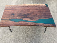 Green epoxy black walnut coffee table with a hard wax finish
