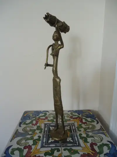 Bronze African Woman Sculpture with Firewood and Axe