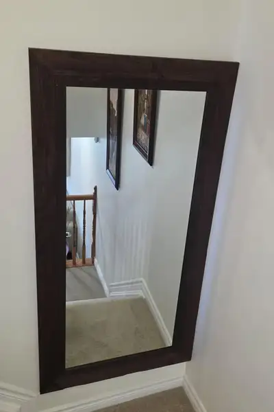 - Enhance your home decor with this beautiful rustic wall mirror, featuring a sturdy dark brown wood...