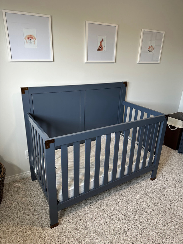Navy blue adjustable height crib in Cribs in St. Albert