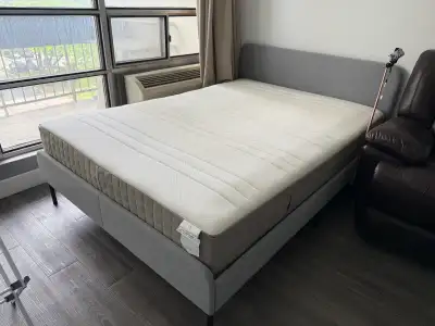Sold as a set Lightly used, grey upholstered bed frame paired with clean mattress. No stains, no sag...