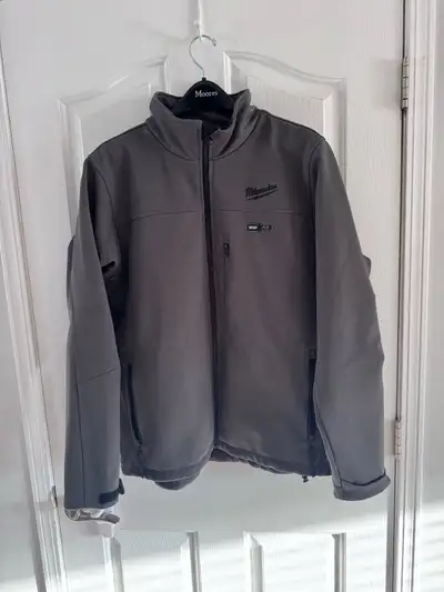 Used maybe 5 times. Works great. Clean, no stains or rips. Comes with charger and one battery.