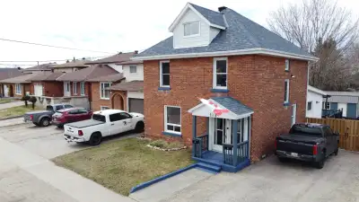 This well-maintained century home is a legal duplex offering two self-contained units with separate...