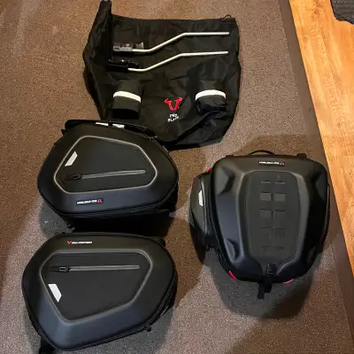 BMW s1000r or BMW s1000rr SW MOTECH brand new pair of pro blaze bags never used and rear bag used on...