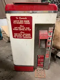 Older coffee grinding machine 