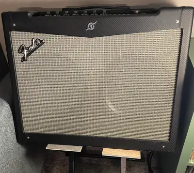 The Fender Mustang IV (Model PR826, serial CGPH12003054) is a powerful 150-watt 2x12” modeling combo...