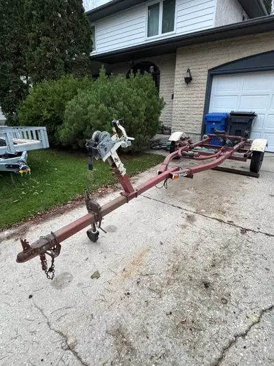 Caulkins roller trailer. The trailer wheels are Carlisle tires, ST175/80D13. The wheels sit 63 inche...