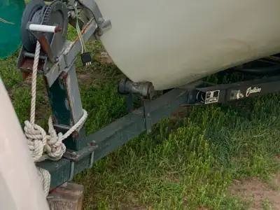 USED CALKINS ROLLER BOAT TRAILER , HAD 18ft INBOARD ON IT , WILL GO TO 20ft I think . No registratio...