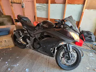 Selling my 2014 ninja 300 abs. About 18,300 km. Runs/rides perfect, just looking to get a bigger bik...