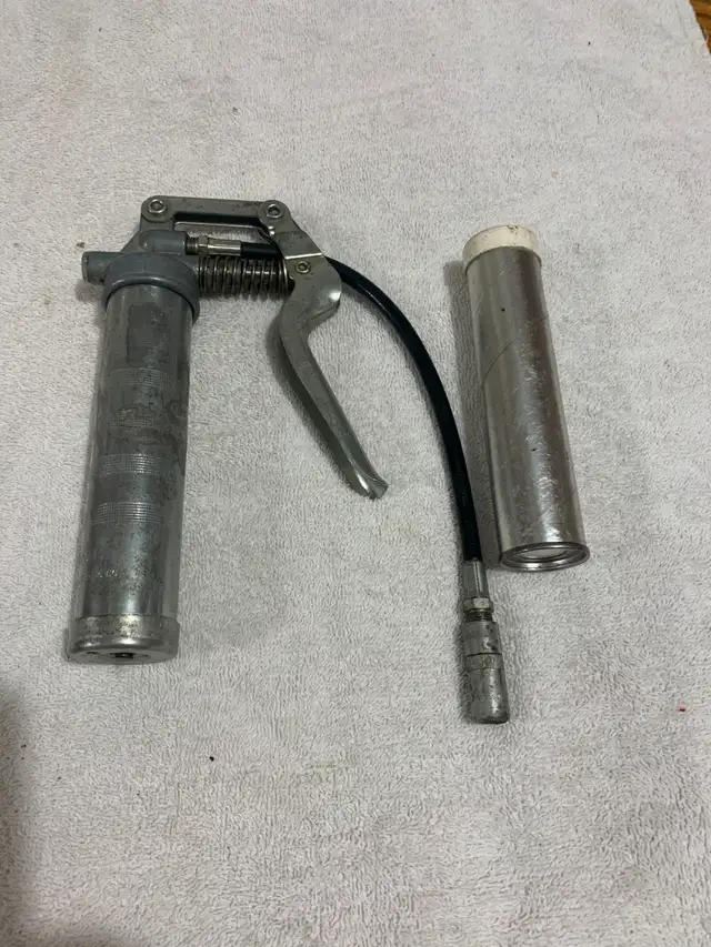 Grease Gun Small Size.494505849626316802
