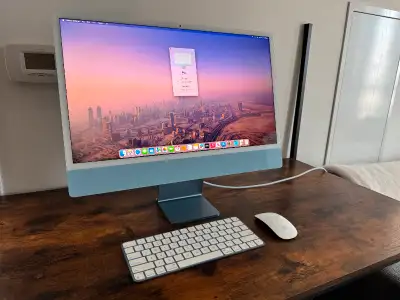 2021 M1 iMac 24” in excellent condition. Comes with Apple Magic Mouse with Touch ID and Magic Mouse....