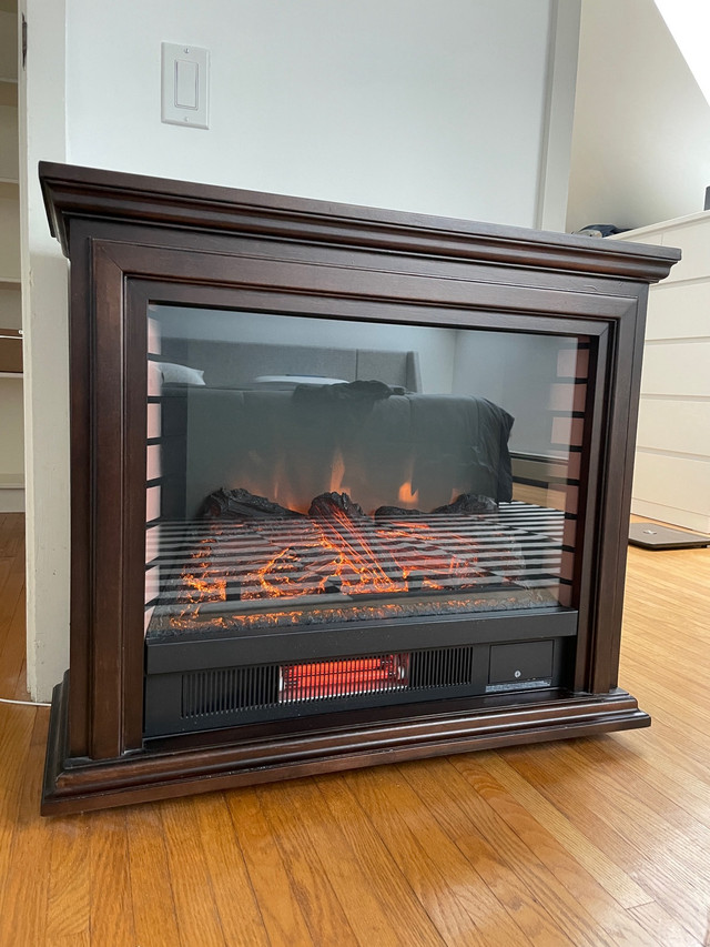 Electric fireplace in like new condition in Fireplace & Firewood in Hamilton