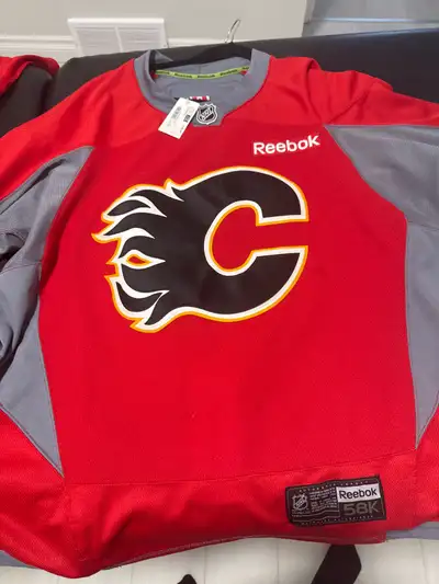 Rebook Calgary Flames NHL jersey. Size is 58+. Player is Devane and the number is 65. In amazing con...