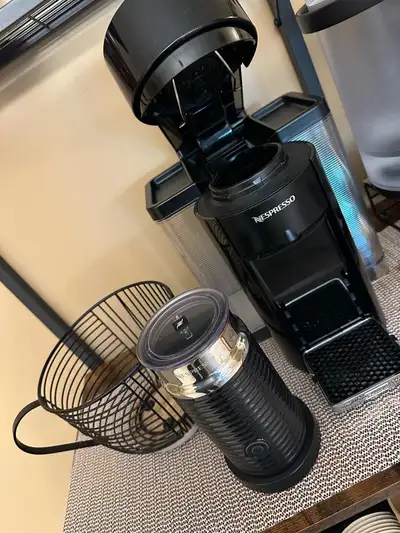 nespresso vertuo with frother and pod holder, View more