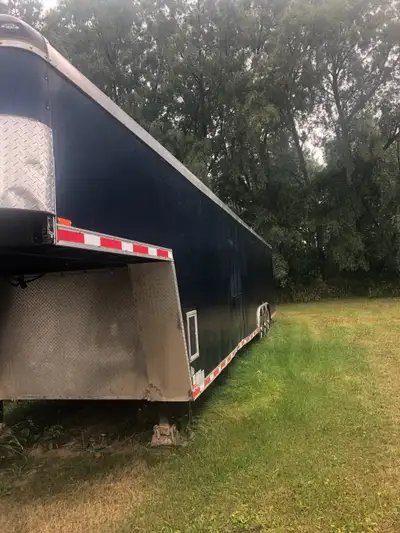 Triple axle enclosed car hauler 44’ 3 spares one on rim led lighting wide side door rear door assist...