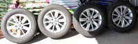 Set of four all-season tires on VW alloy rims - Mint Condition