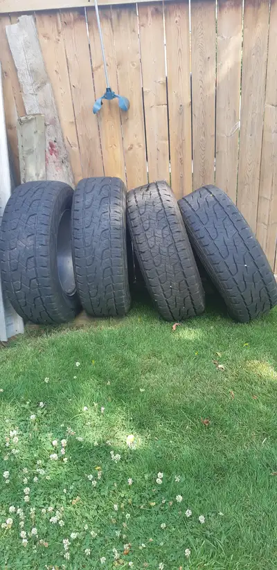 4 Chevy truck tires with Alloy rims for sale. 275/65R/18LT 80% tread $1200 or OBO