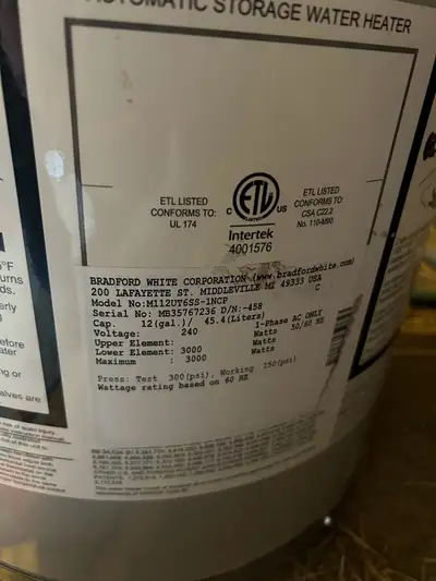 Selling a used Bradford White 12-gallon water heater, model number M112UT6SS-1NCP, perfect for a cot...