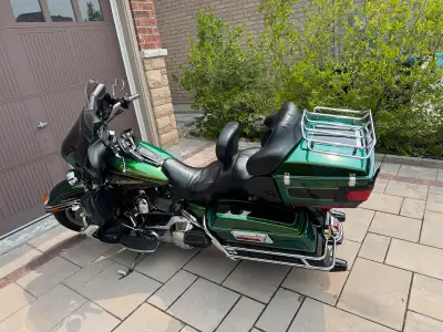 Get ready to ride in style with this Rare 2006 Harley-Davidson Ultra Classic. This bike features the...