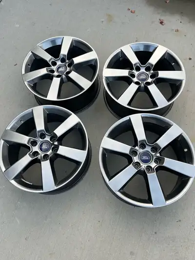 Hi I am selling my Ford F150 Lariat Sport Wheels Original Equipment 20" 6x135 Factory Rim 6 lug bolt...