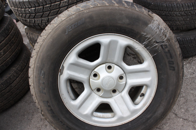 225/75/16 JEEP WRANGLER ALL SEASON TIRES on JEEP RIMS 5x127mm in Tires & Rims in Ottawa